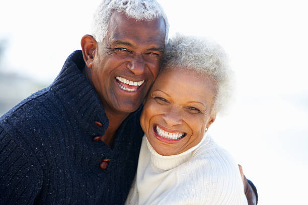 Aged couple smiling happily