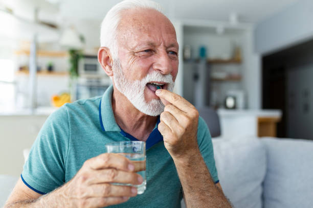 An aged man taking NMN supplement